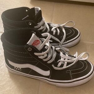 Vans Black and White High-Top Sneakers